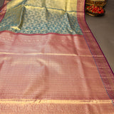 Sage Green Kanjivaram Silk Saree With Purple Border And Multicolour Paisley Weave