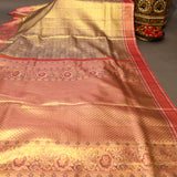 Majestic Antique Bronze And Crimson Red Kanjivaram Silk Saree With Gold Zari Peacock Motifs