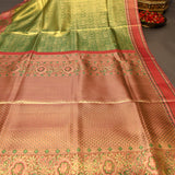 Radiant Leaf Green And Rose Pink Kanjivaram Silk Saree With Gold Zari Checkered Motif Weave