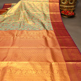 Mint Green Kanjivaram Silk Saree With Magenta Floral Zari Border
