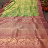 Green Kanjivaram Silk Saree With Purple Lotus Motif Border