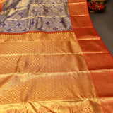 Navy Blue Kanjivaram Silk Saree With Red Border And Gold Zari Floral Weave