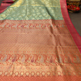 Sage Green Kanjivaram Silk Saree With Red Contrast Border And Dual-Tone Zari Paisley Weave