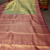 Pista Green Kanjivaram Silk Saree With Magenta Border And Gold Zari Floral Weave