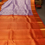 Pure Kanjivaram Silk Saree — Lavender With Orange-Red Contrast Border & Gold Zari Floral Pallu
