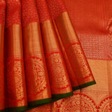 Red Kanjivaram Silk Saree With Gold Medallion Border And Green Edge
