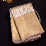 Silver-Gold Tissue Silk Saree With Floral Weave And Zari Border