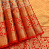 Rust Orange Kanjivaram Silk Saree With Red Border And Multicolour Floral Medallion Weave