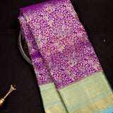 Vibrant Purple Kanjivaram Saree With Contrast Mint Green Zari Borde