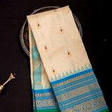 Cream Gadwal Pattu Silk Saree With Peacock Blue Border