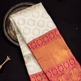 Regal Off-White Kanjivaram Silk Saree With Grand Pink And Gold Zari Border