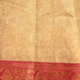 Beige Kanjivaram Silk Saree With Pink Border And Gold Zari Floral Weave