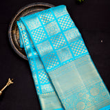 Turquoise Blue Kanjivaram Silk Saree With Gold Zari Diamond Lattice & Floral Border