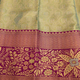 Pista Green Kanjivaram Silk Saree With Magenta Border And Gold Zari Floral Weave