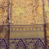 Gold Kanjivaram Silk Saree With Navy Blue Contrast Border And Multicolour Floral Medallion Weave