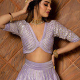 Lavender Cotton Lehenga With Gold Striped Border And Potli