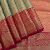 Pista Green And Pink Kanjivaram Silk Saree With Zari Paisley Border