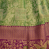 Green Kanjivaram Silk Saree With Purple Lotus Motif Border