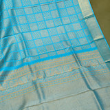 Turquoise Blue Kanjivaram Silk Saree With Gold Zari Diamond Lattice & Floral Border