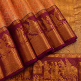 Orange Kanjivaram Silk Saree With Purple Pictorial Zari Border