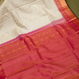 Regal Off-White Kanjivaram Silk Saree With Grand Pink And Gold Zari Border
