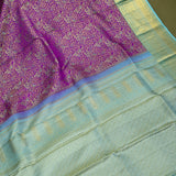 Vibrant Purple Kanjivaram Saree With Contrast Mint Green Zari Borde