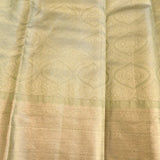 Lustrous Metallic Grey & Gold Handwoven Kanjivaram Silk Saree With Minimalist Texture