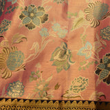 Pink Kanjivaram Silk Saree With Blue Floral Motifs And Black Zari Border