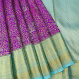 Vibrant Purple Kanjivaram Saree With Contrast Mint Green Zari Borde