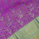 Vibrant Purple Kanjivaram Saree With Contrast Mint Green Zari Borde