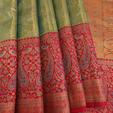 Sage Green Kanjivaram Silk Saree With Red Contrast Border And Dual-Tone Zari Paisley Weave