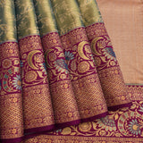 Sage Green Kanjivaram Silk Saree With Purple Border And Multicolour Paisley Weave