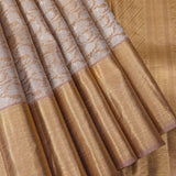 Silver-Gold Tissue Silk Saree With Floral Weave And Zari Border