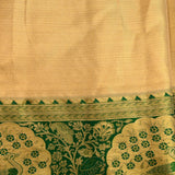 Graceful Metallic Beige And Green Kanjivaram Silk Saree With Gold Zari Peacock Motifs
