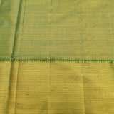 Graceful Metallic Beige And Green Kanjivaram Silk Saree With Gold Zari Peacock Motifs