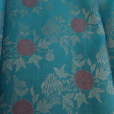 Teal Blue Kanjivaram Silk Saree With Self Border And Multicolour Rose Weave