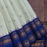 Elegant Cream And Royal Blue Gadwal Pattu Saree With Traditional Paisley Border