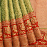 Pastel Green Kanjivaram Silk Saree With Red Lotus Motif Border