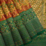 Exquisite Copper-Red And Green Kanjivaram Silk Saree With Geometric Weaving