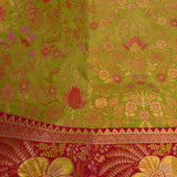 Lime Green Kanjivaram Silk Saree With Rani Pink Floral Border