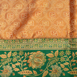 Rust Orange Kanjivaram Silk Saree With Green Border And Gold Zari Lotus Weave