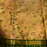 Golden Beige Kanjivaram Silk Saree With Bottle Green Woven Border And Pink Floral Jaal