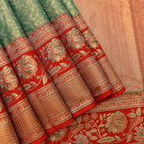 Sage Green Kanjivaram Silk Saree With Red Border And Gold Zari Lotus Weave