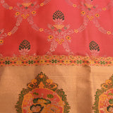 Kanjivaram Silk Saree In Coral Red With Multicolour Floral Buttas And Contrast Antique Gold Medallion Border