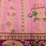 Graceful Pastel Pink Kanjivaram Silk Saree With Contrast Purple Floral Border