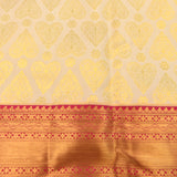 Timeless Cream And Rani Pink Kanjivaram Silk Saree With Gold Zari Motifs
