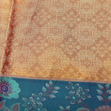 Rust Orange Kanjivaram Silk Saree With Teal Border And Multicolour Sunflower Weave