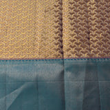 Rust Orange Kanjivaram Silk Saree With Teal Border And Multicolour Sunflower Weave