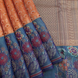 Orange Kanjivaram Silk Saree With Steel Blue Border And Multicolour Floral Weave