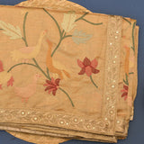 Pastel Yellow Sheer Organza Printed Saree With Multicolour Floral Clusters And Woven Gold Zari Border